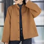 Short bomber jacket with snap buttons